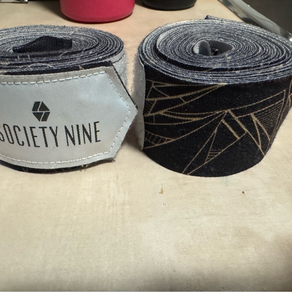 Black and Gold Boxing Wraps for Enhanced Support